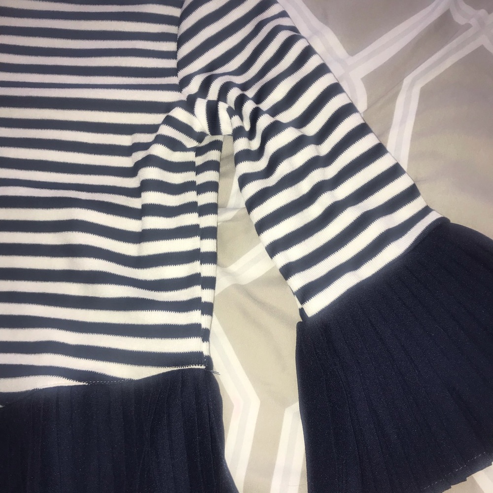 Beautiful blouse. White with Navy strips.